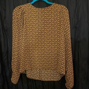 Cute orange and navy blouse from h&m. Great for the office. Size 14